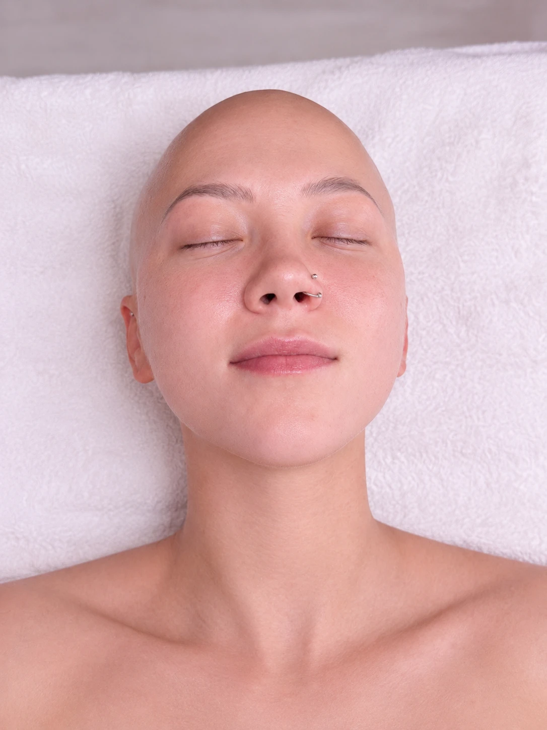 Client receiving a sculptural buccal face massage session in Midtown Manhattan